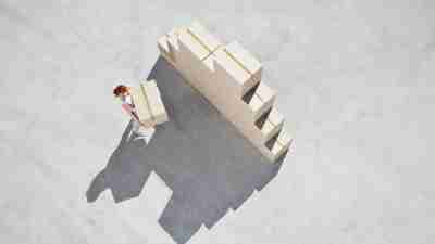 woman stacking boxes to illustrate habit stacking